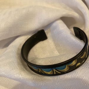 cuff from vintage tin