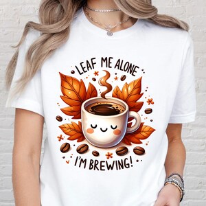Leaf Me Alone I’m Brewing Shirt, Cute Coffee Lover Gift Tee, Funny Fall Graphic T-Shirt, Autumn Pumpkin Spice Latte Cozy Top