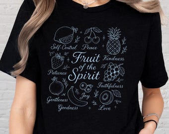 May include: Black t-shirt with a light blue graphic design featuring various fruits and the words "Fruit of the Spirit." The design includes a lemon, cherries, pineapple, strawberry, grapes, and a banana.