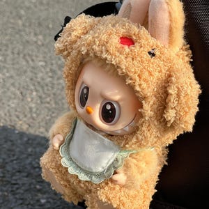 Caramel Bunny Doll Outfit – Labubu Plush Romper with Embroidered Face & Lace Bib