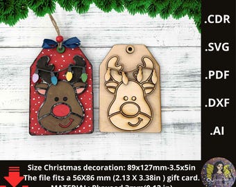 May include: Two Christmas reindeer tag ornaments. One is red with white polka dots and a reindeer face with a red nose and colorful lights. The other is a wooden reindeer tag. The text says: Size Christmas decoration: 89x127mm. MATERIAL: Plywood 3mm(0.12 in).
