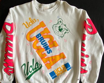 90s Rare Gotta Have UCLA Bruins Double Sided All Over Graphics White Oversize L/S Sweatshirt Game Warmer Sweats by Majestic Size XL