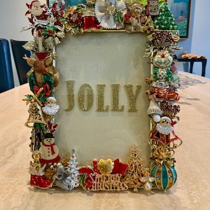 Christmas 2026 Jolly Vintage Jeweled Picture Frame OOAK Featuring a Dazzling Array of Angels Santas Reindeer Trees and More Size 9” x 8”