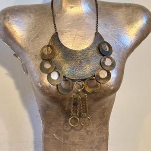 70’s  80’s Artisan Handcrafted Modernist Hammered Brass Oversize Bib Collar Necklace with Decorative Discs and Dangling Center Drop Unisex