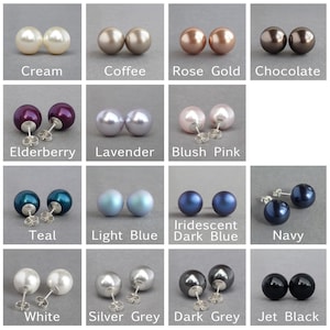 May include: A set of 12 pairs of pearl earrings in various colors, including cream, coffee, rose gold, chocolate, elderberry, lavender, blush pink, teal, light blue, iridescent dark blue, navy, white, silver grey, dark grey, and jet black.
