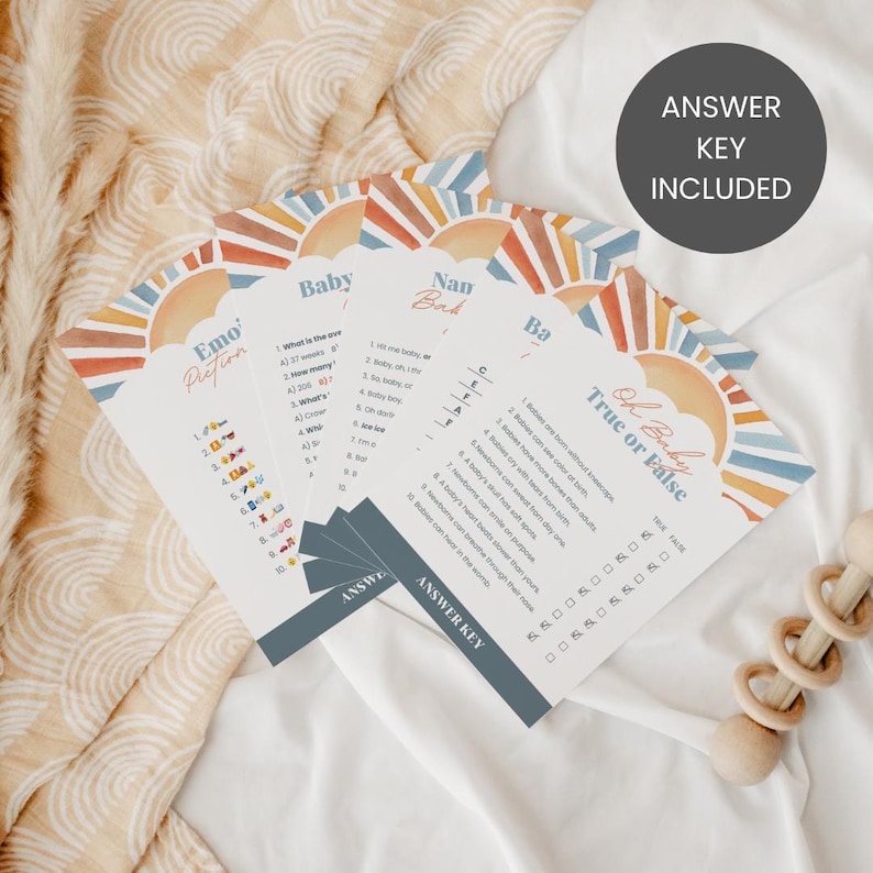 Puede incluir: Un juego de tarjetas para baby shower con un dise&ntilde;o de sol en acuarela en naranja, amarillo y azul. Las tarjetas incluyen el texto "Emo Prefion", "Baby", "Nan Bad" y "Oh Baby True or False". Tambi&eacute;n se ve el texto "Answer Key Included".