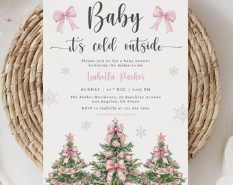 Puede incluir: Invitación a baby shower con el texto "Baby it's cold outside". La invitación presenta lazos rosas, copos de nieve y árboles de Navidad. Detalles: nombre Isabella Parker, fecha, hora y lugar.