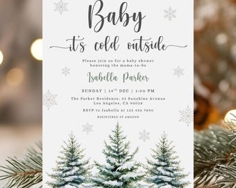 Op de afbeelding: Een uitnodiging voor een babyshower met de tekst "Baby it's cold outside". De uitnodiging bevat een aquarel illustratie van met sneeuw bedekte groenblijvende bomen aan de onderkant en sneeuwvlokken verspreid over de witte achtergrond. De uitnodiging is voor Isabella Parker.