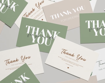 May include: A collection of thank you cards in various colors, including sage green and beige. The cards feature the words "Thank You" and "Thank You for Your Order" in elegant fonts. Some cards have a small heart icon.