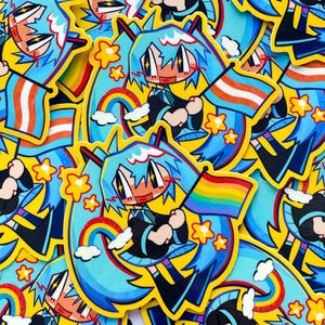Peut inclure: Une collection d'autocollants découpés représentant un personnage d'anime stylisé aux cheveux bleu vif, vêtu d'une tenue noire, tenant un drapeau arc-en-ciel, entouré d'étoiles jaunes, de petits nuages blancs et d'un arc-en-ciel coloré.