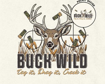 May include: A graphic design featuring a deer head with antlers centered behind two crosshair circles. Camouflage shotgun shells, cattails, and the text BUCK WILD Tag it, Drag it, Crack it are displayed. Includes a pocket design circle.
