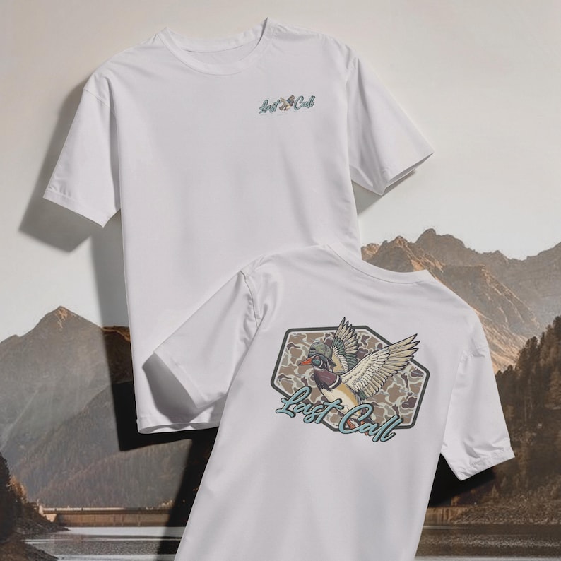 May include: Two white t-shirts. One shirt has the text "Last Call" on the front. The other shirt has a graphic of a duck with the text "Last Call" in a hexagon shape on the back. The duck graphic has a camouflage pattern.