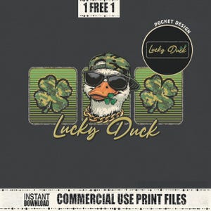 May include: Graphic design featuring a duck wearing sunglasses, a camouflage hat, and a gold chain. The duck holds a shamrock in its beak. The text "Lucky Duck" is below the duck, with shamrock designs on either side.