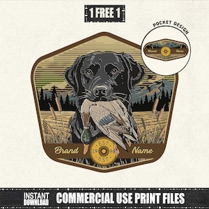 May include: A graphic design featuring a black Labrador Retriever holding a duck in its mouth. The design includes the text "Brand Name" and "EST 1996 EST". The background depicts a landscape with trees and mountains. The words "1 FREE 1" and "POCKET DESIGN" are also visible.