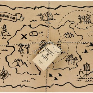 May include: A brown paper treasure map with a black and white pirate theme. The map features a compass, islands, a skull and crossbones, and the text "Treasure Map" and "Pirates Party".