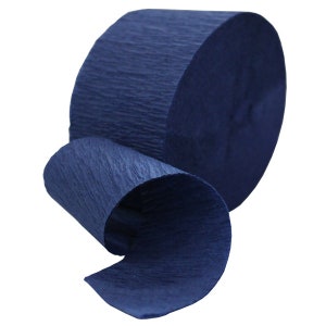 May include: A roll of blue crepe paper streamers. The paper is crinkled and has a textured look.