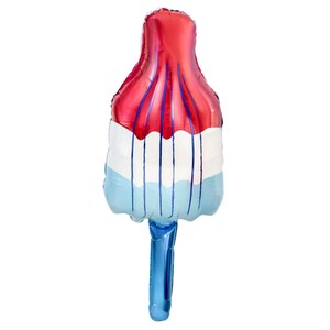 May include: A red, white, and blue popsicle-shaped balloon. The top section is red with blue vertical lines, the middle is white with blue vertical lines, and the bottom is light blue. A blue stick extends from the bottom.