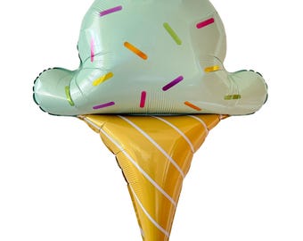 May include: A green ice cream cone balloon with sprinkles and a yellow cone. The balloon is made of foil and has a shiny finish.