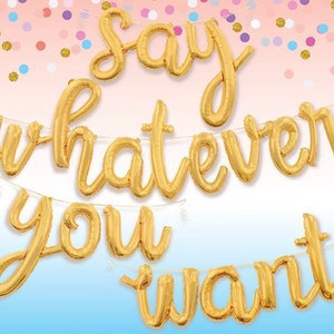 Pode incluir: Faixa de balões de folha de ouro que diz "Say whatever you want".