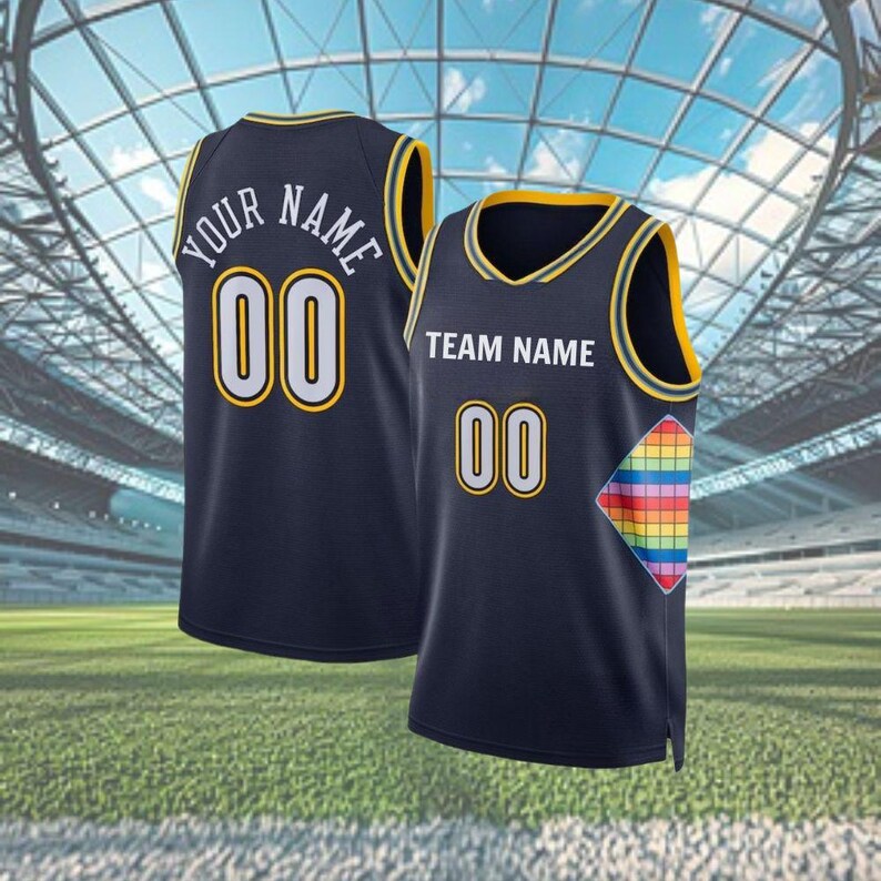 May include: Two navy blue basketball jerseys with yellow trim. One jersey has "YOUR NAME" and the number "00" on the back. The other jersey has "TEAM NAME" and "00" on the front, with a rainbow-coloured diamond design.