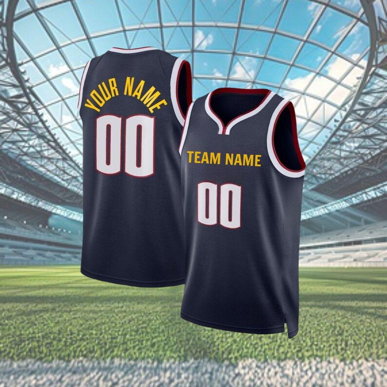 May include: Two navy blue basketball vests with white and red trim. One vest displays "YOUR NAME" and the number "00" in white and gold lettering. The other vest shows "TEAM NAME" and the number "00".
