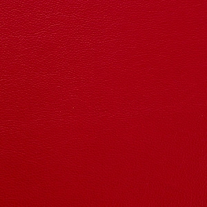 May include: A close-up of a solid red leather texture. The surface shows a fine, natural grain, giving a rich, tactile feel. The consistent colour and texture suggest a material suitable for various applications.