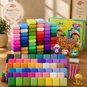 May include: An air dry clay kit featuring 104 rectangular blocks in a wide spectrum of colors, arranged in vertical stacks and horizontal rows. The set includes a green box labeled Joori Rose Air Dry Clay Kit, sculpting tools, and clay figures.