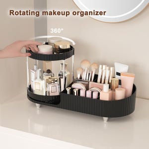 May include: A black rotating makeup organizer with two tiers and a separate section. The top tier holds jars and containers, while the bottom section contains makeup brushes, tubes, and bottles. The text "Rotating makeup organizer" is visible.