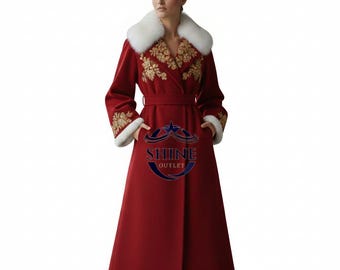 May include: A long, red coat with a white fur collar and cuffs. The coat features gold embroidery on the front and sleeves, a matching belt, and the text "SHINE OUTLET" on the front.