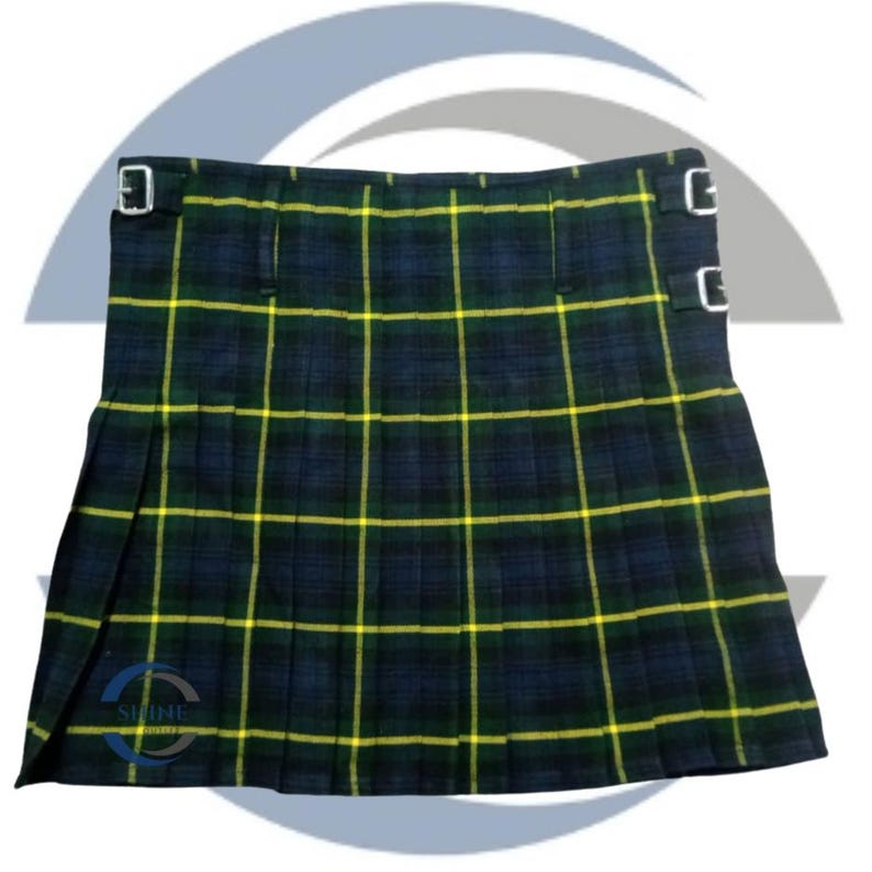 May include: A traditional kilt in a green, navy, and yellow plaid pattern. The kilt features pleats and adjustable straps with silver buckles. The fabric has a woven texture, and the design is symmetrical.