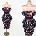 amykparis reviewed VINTAGE 1980s Victor Costa Avant-Garde Floating Petal Bust Dress | 80s Peplum Waist Party Dress | Wasp Waist Extreme 80s Cocktail Dress | 10