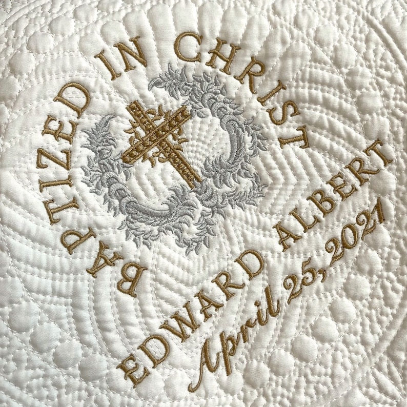 Embroidered baptism blanket personalized with name, date and cross.