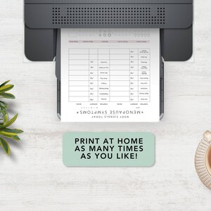 May include: A white paper sheet with a Menopause Symptoms tracker chart printed from a black printer. The chart includes columns for symptoms, intensity, and notes. A light green rectangular sign reads: PRINT AT HOME AS MANY TIMES AS YOU LIKE!