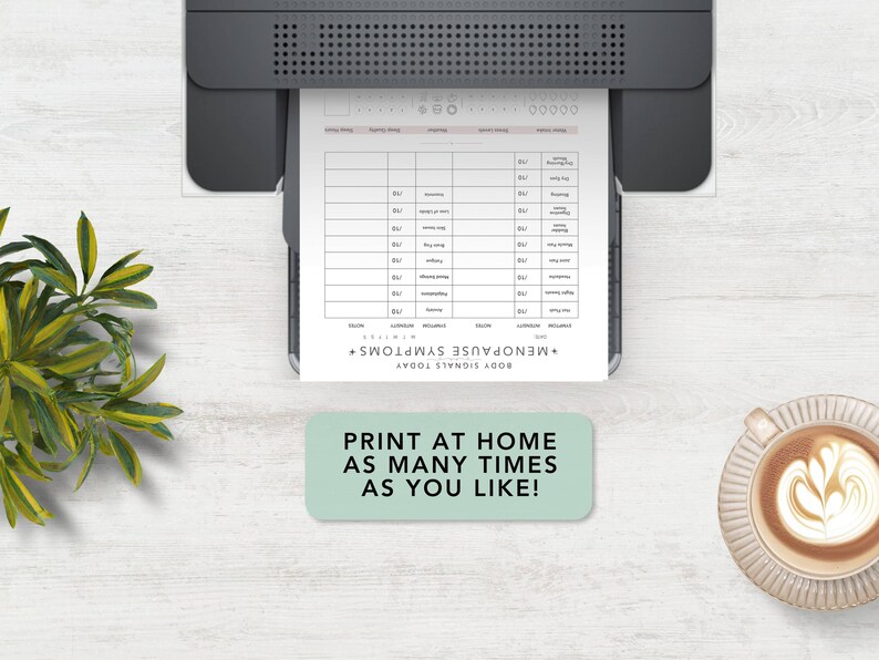 May include: A white paper sheet with a Menopause Symptoms tracker chart printed from a black printer. The chart includes columns for symptoms, intensity, and notes. A light green rectangular sign reads: PRINT AT HOME AS MANY TIMES AS YOU LIKE!