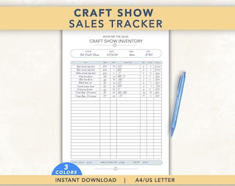 May include: A white paper craft show sales tracker sheet with black text and grid lines. The document includes headers for event details, inventory items, prices, quantities, and sales totals. A blue ballpoint pen rests on the right side of the page.