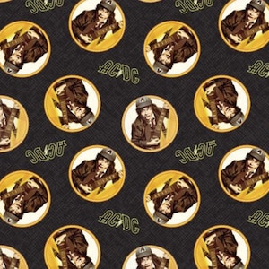 May include: A black and white fabric with a repeating pattern of yellow circles. Each circle contains a cartoon image of a person playing a guitar with the text "AC/DC" in a yellow lightning bolt design.