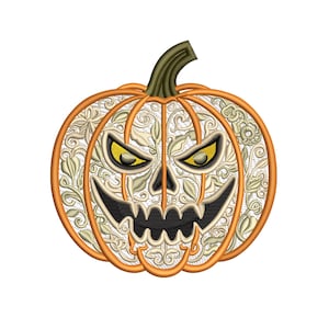 May include: Embroidered Halloween pumpkin with an orange outline and a carved face. The pumpkin features a detailed floral design in cream and green, with yellow eyes and a black mouth. The stem is dark green.