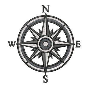 May include: Embroidered compass design in black, grey, and white. The compass rose features directional indicators: N, W, E, and S. The design is circular with a detailed starburst pattern, suitable for nautical or travel-themed projects.
