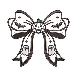 May include: A black and white embroidered bow featuring a central jack-o'-lantern with a green stem. The bow is decorated with stitched patterns of flying bats, small ghosts, and four-pointed stars on both the loops and the long hanging tails.