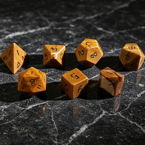May include: A set of seven polyhedral dice crafted from light brown wood with visible grain patterns and dark brown engraved numbers. The collection includes a d4, d6, d8, d10, d12, d20, and a percentile die, all featuring sharp edges and geometric shapes.