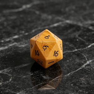 May include: A twenty-sided die crafted from smooth, golden-brown stone with visible natural veining. The die features black, hand-written style numerals including 6, 8, 14, 16, and 20 clearly etched onto its triangular faces for tabletop gaming.