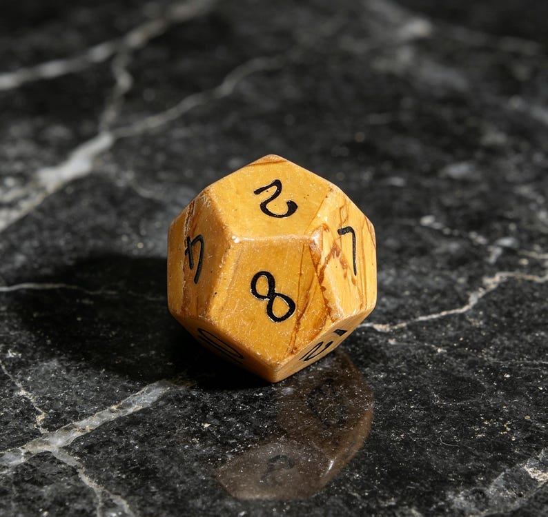 May include: A twenty-sided die crafted from tan and brown marbled stone. The die features black engraved numbers, including a prominent eight, a two, and a seven, distributed across its triangular faces with a smooth, polished finish.