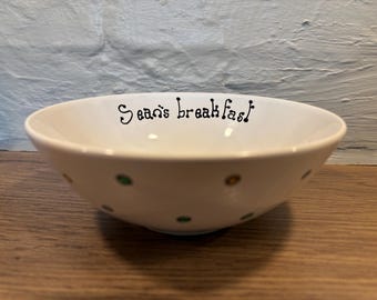 Personalised hand paint ceramic bowl. Customised with your choice of text and a patterned outside.