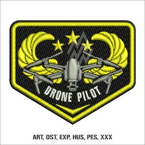 May include: A yellow and black embroidered patch with a drone and wings. The text "DRONE PILOT" is written in white on the patch.