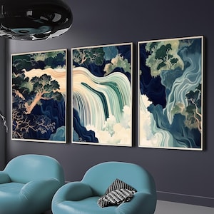 Może przedstawiać: Zestaw trzech oprawionych wydruków artystycznych przedstawiających stylizowane krajobrazy z wodospadami i drzewami. Grafika wykorzystuje kolory niebieskie, zielone i beżowe. Ramki mają złote wykończenie, tworząc spokojną atmosferę.