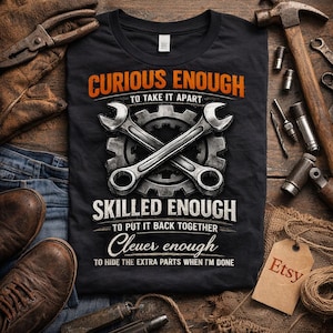 May include: Black t-shirt with the text "CURIOUS ENOUGH TO TAKE IT APART, SKILLED ENOUGH TO PUT IT BACK TOGETHER, Clever enough TO HIDE THE EXTRA PARTS WHEN I'M DONE." The design includes crossed wrenches and a gear.