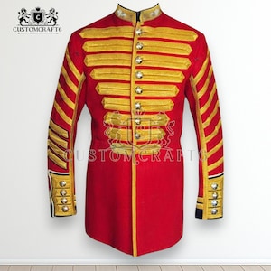 May include: A red military-style jacket with gold embroidery and buttons. The jacket features a high collar and decorative gold stripes on the sleeves and chest. The text "CUSTOMCRAFT6" is visible on the upper left.