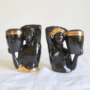 Ceramiczne popiersia Blackamoor z połowy XX wieku: mężczyzna i kobieta z dzbanami