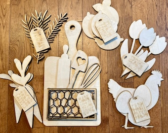 May include: Wooden cutouts of various fruits, vegetables, and flowers with text that reads "Fresh Carrots", "Spring Tulips", "Farm Fresh", "Made With Love", and "Fresh Lemons".