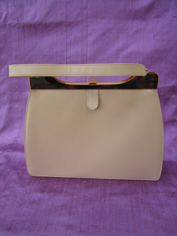 19. Cross ivory leather mid-century handbag